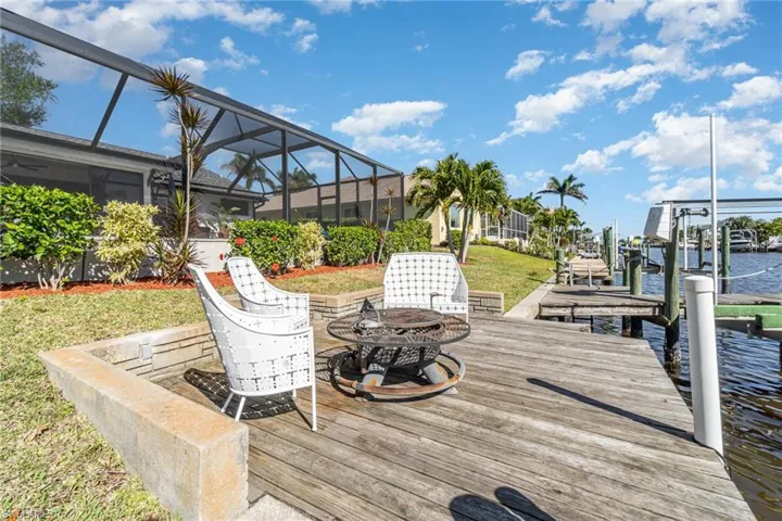 View of dock featuring firepit