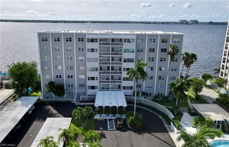 View of building exterior featuring a water view