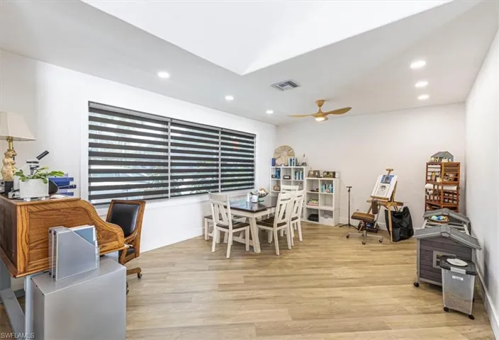 Dining area featuring recessed lighting, light wood-style flooring, and a ceiling fan