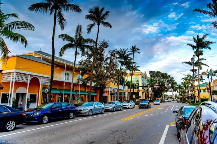 View of asphalt street with street lighting