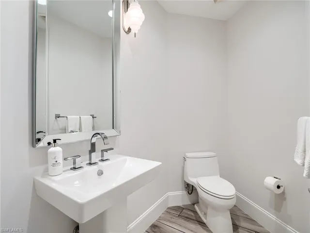 Half Bathroom off kitchen and living room