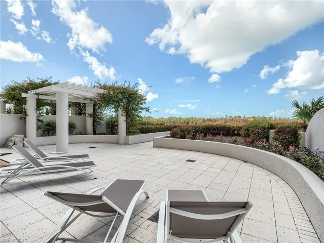 Rear Private patio, Walk right out, down one flight of stairs to the community pool and a short walk to the dog park.