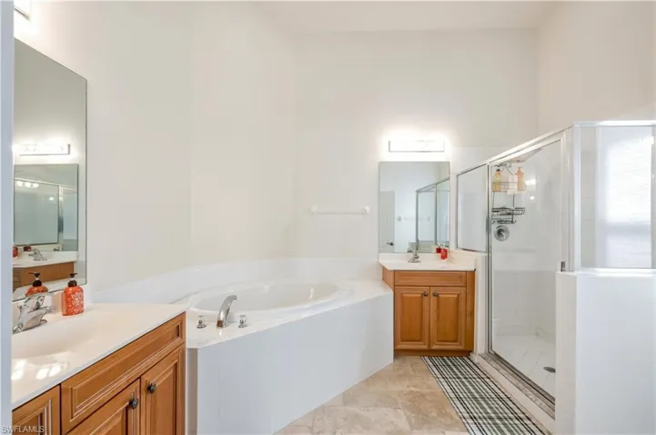 double vanity, tub and shower walk in shower
