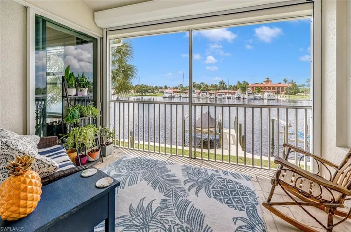 enclosed lanai overlooking water and dock