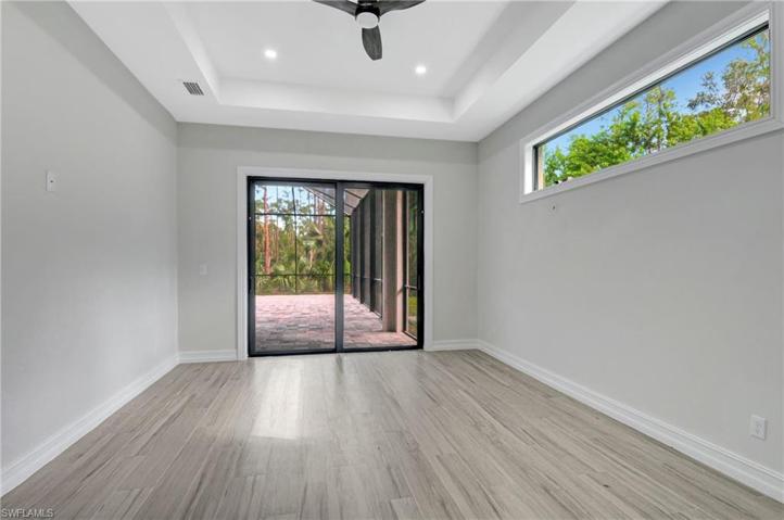 Primary Bedroom w sliders to outdoor area