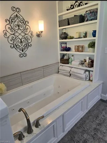 Bathroom featuring a washtub