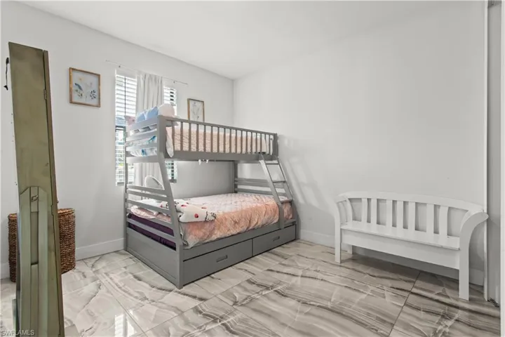 Bedroom with baseboards