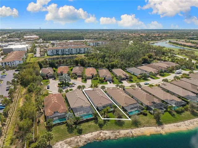 Aerial view of residential area with a nearby body of water