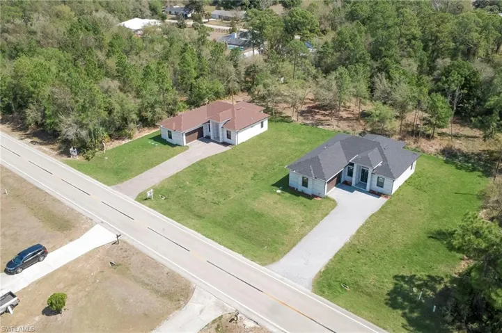 Aerial view of property and surrounding area