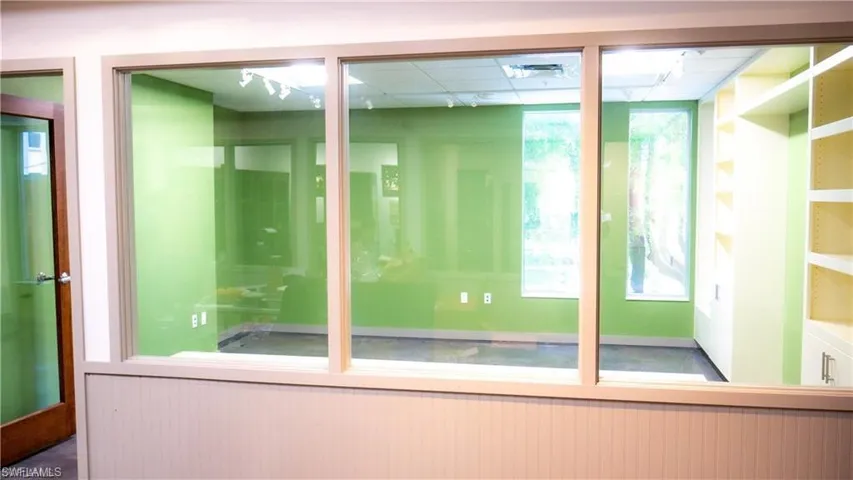 Bathroom with a wainscoted wall