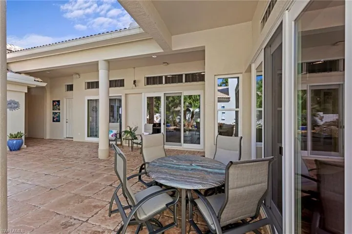 View of patio featuring outdoor dining area