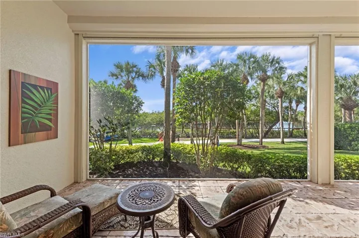 Primary Bedroom View of Screened Lanai with river beyond