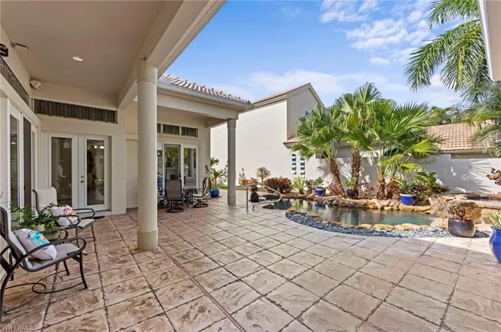 View of patio / terrace featuring french doors and an outdoor pool