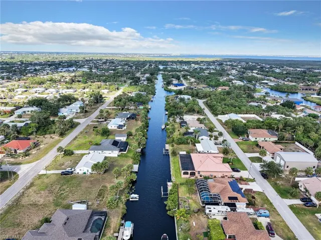 Aerial view of residential area with a nearby body of water
