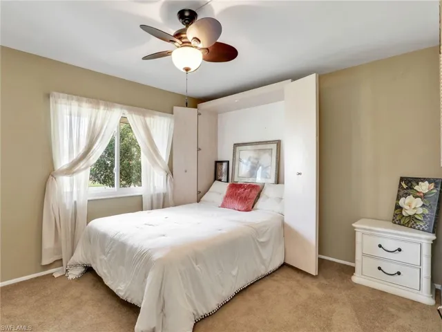 Bedroom featuring built-in Murphy bed