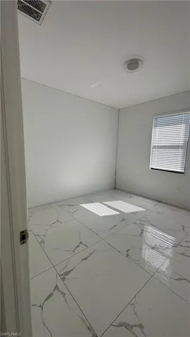 Empty room with marble finish flooring