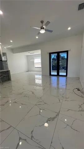 Spare room with recessed lighting and ceiling fan