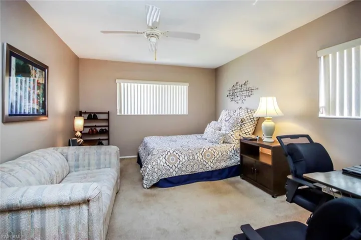 Bedroom with carpet flooring and ceiling fan