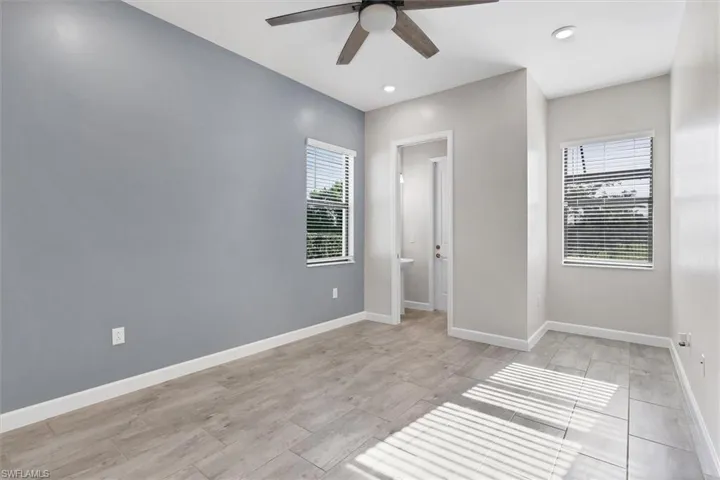 Unfurnished room featuring ceiling fan and recessed lighting
