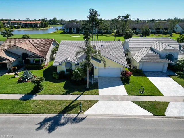 Aerial view with a residential view and a water view