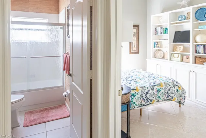 Bedroom featuring tile patterned floors