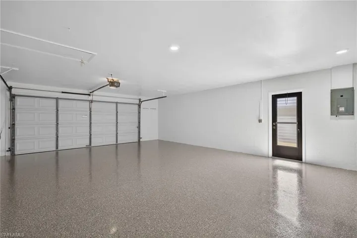 Garage featuring electric panel