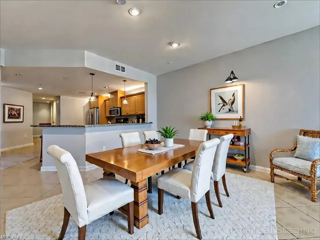 Dining room with light tile patterned floors, recessed lighting, baseboards, and visible vents