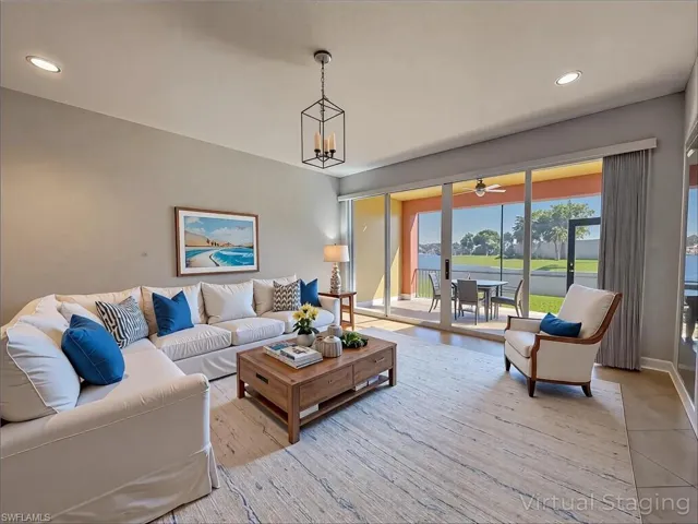 Living area featuring baseboards, recessed lighting, and a ceiling fan