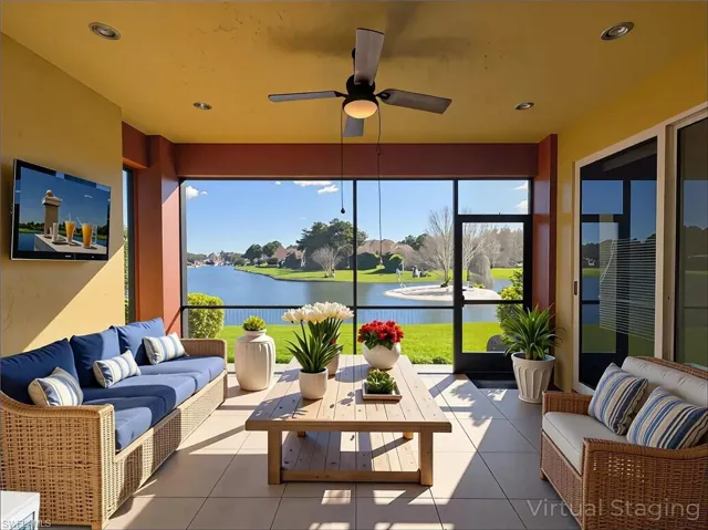 Sunroom with a water view