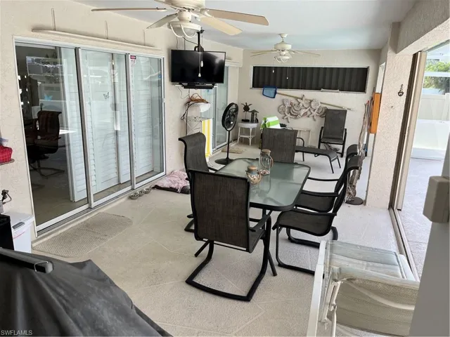 Sunroom with ceiling fan