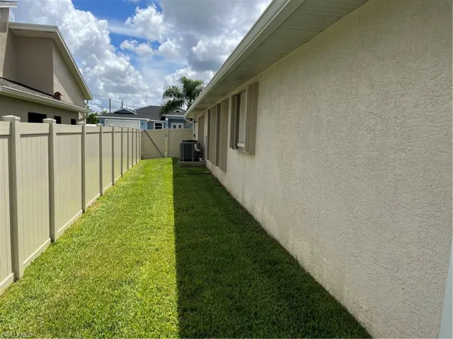 View of yard featuring central air condition unit