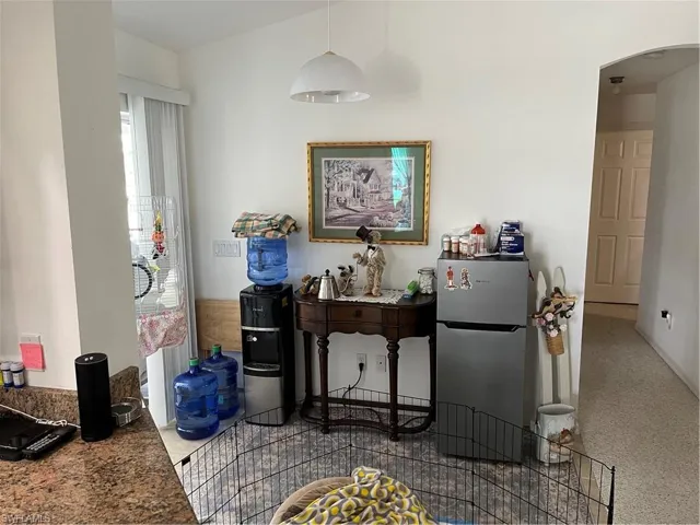 View of carpeted home office