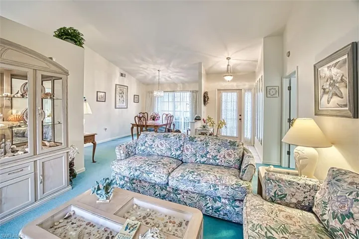 Living room w/ chandelier