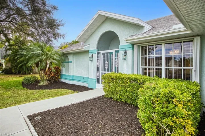 Gated and screened covered front porch
