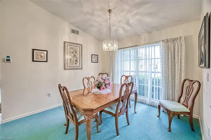 Formal dining room with chandelier