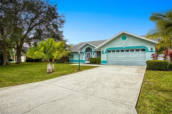 Ranch-style home with long driveway