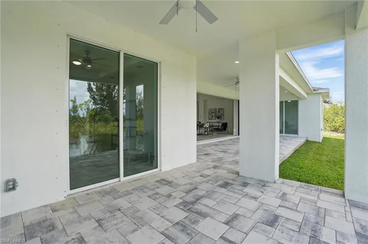 View of patio with ceiling fan