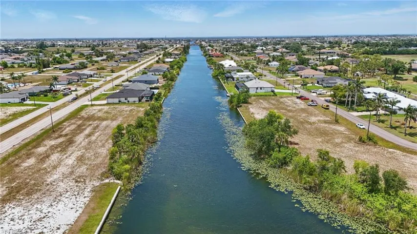 Aerial view of residential area with a large body of water