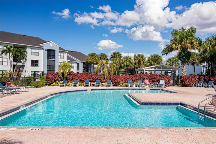 Community pool featuring a patio area