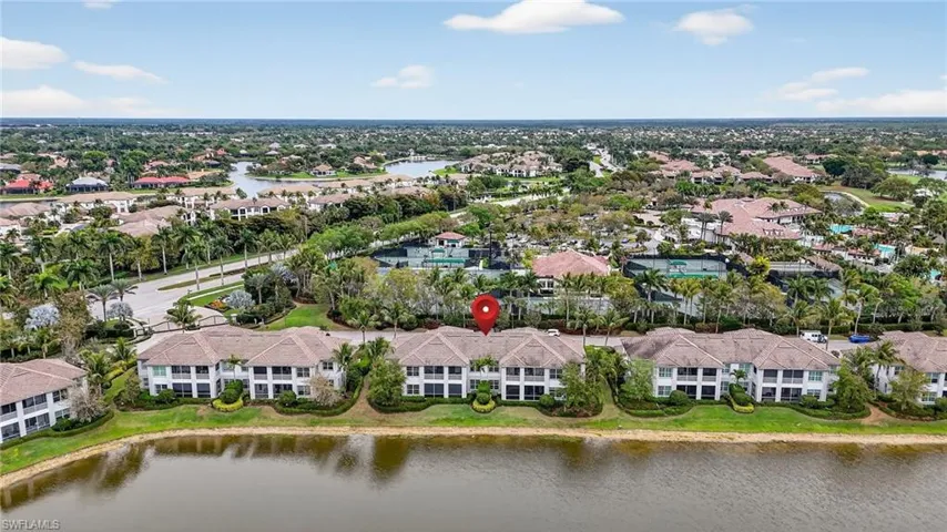 Aerial view of residential area with a nearby body of water