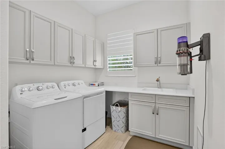 Spacious Laundry area with Laundry tub and handy folding area