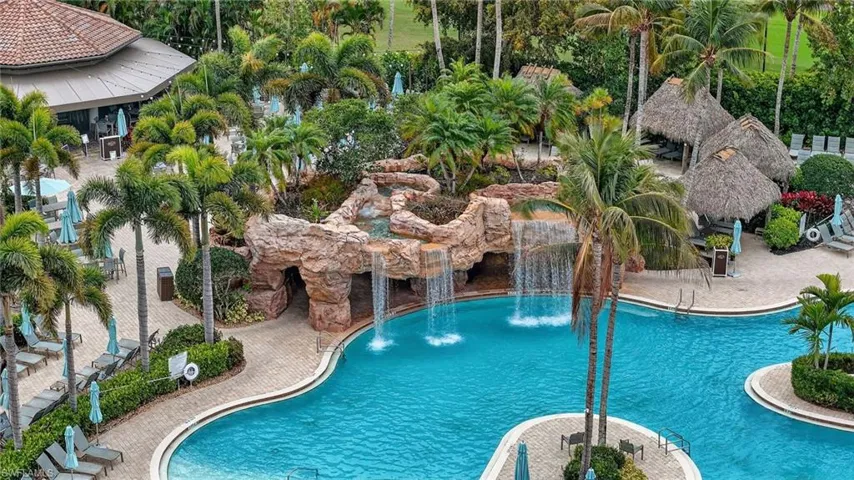 Community pool with a patio area