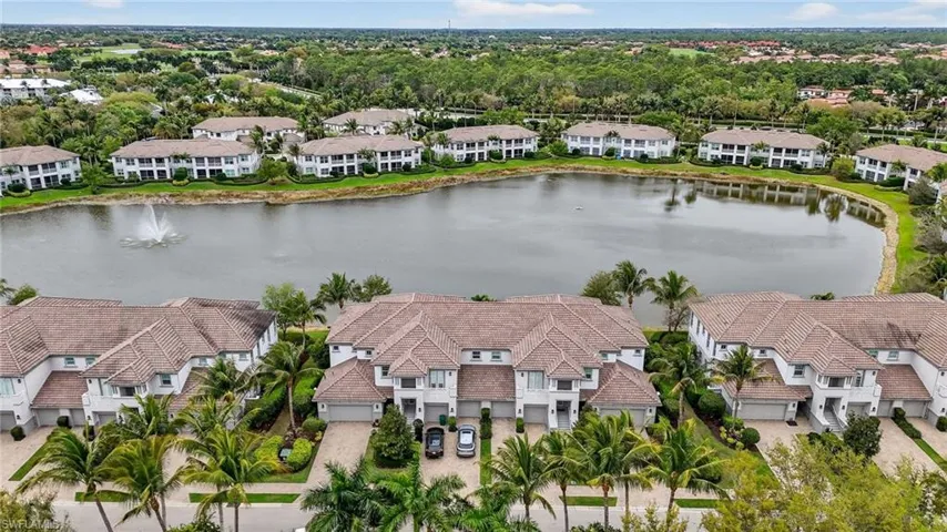 Aerial view of residential area featuring a water views