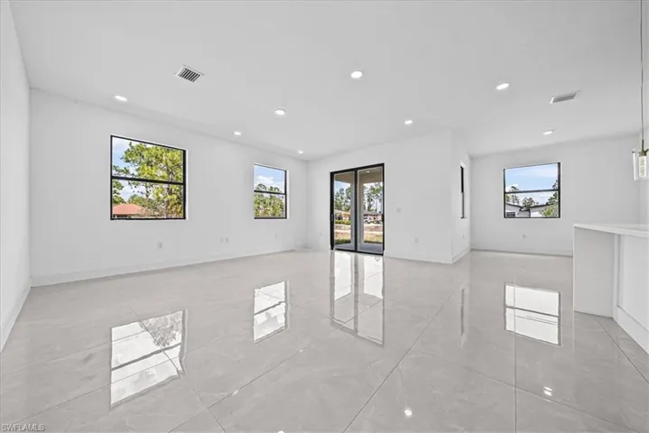 Unfurnished room featuring recessed lighting