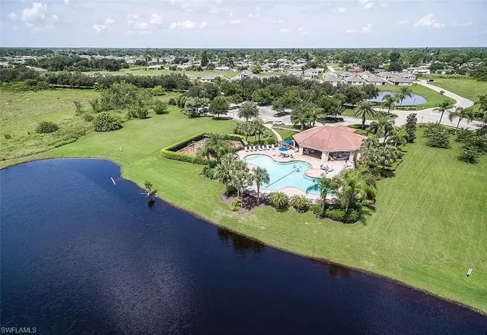 Aerial view of a large body of water and a pool area