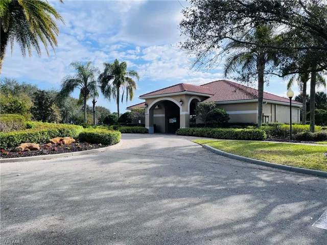 View of property with driveway