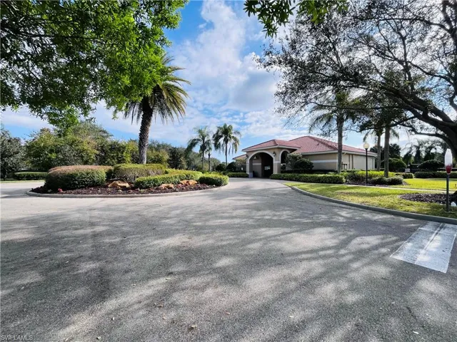 View of asphalt road with curbs