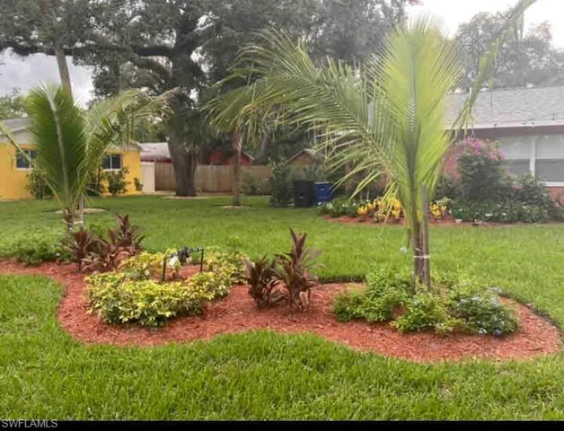 View of front yard and lovely landscaping