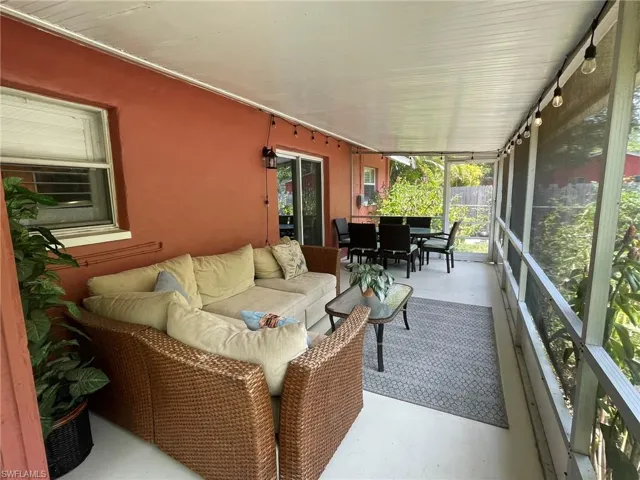 Lanai featuring outdoor lounge area and outdoor dining space
