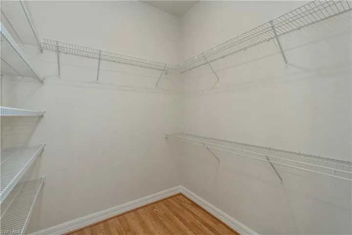 Master Walk in closet with bamboo floors
